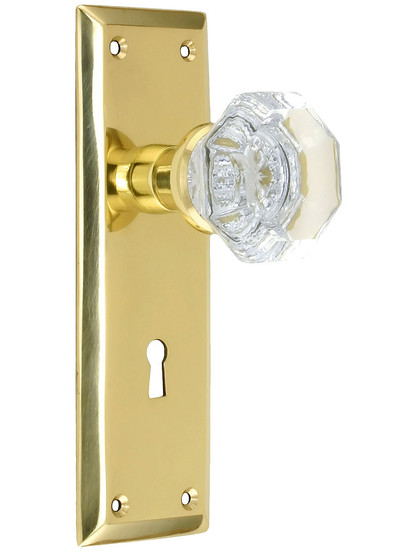 New York Style Mortise Lock Set with Waldorf Crystal Door Knobs in Unlacquered Brass.